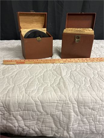 Two really nice record storage leather boxes with a big variety of records