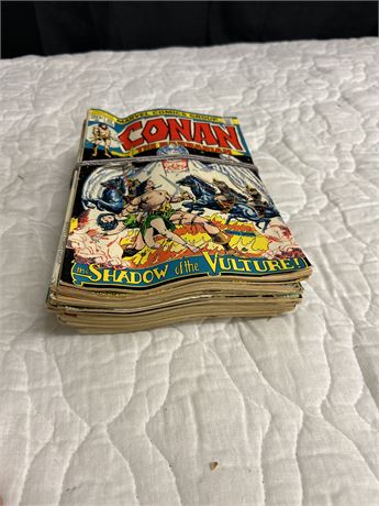 A collection of vintage comics with CONAN THE BARBARIAN AND DC COMICS AND OTHERS