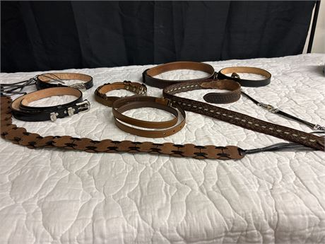 A Collection of leather belts and one made out of horse hair