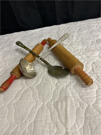 Two Vintage rolling pins with Vintage soup spoon and serving spoon