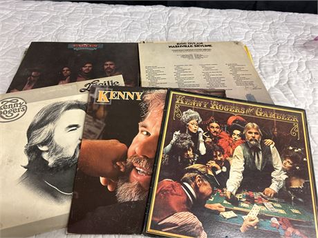 A collection of records with Kenny Rogers,The Eagles And BOB DYLAN to name a few