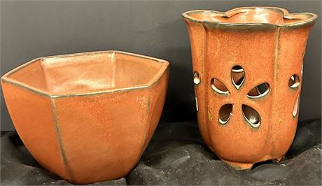 Beautiful clay pot with a candle holder