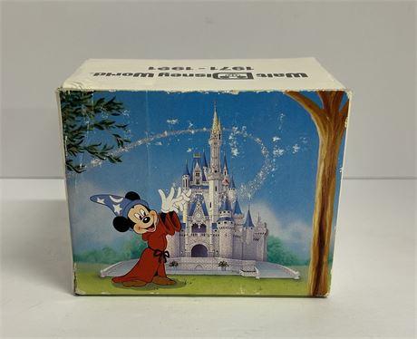 A small Walt Disney World 1971 through 1991 coffee cup