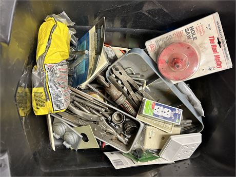 Tub full of a variety of different tools