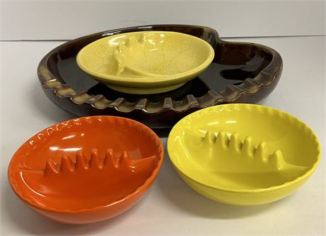 Four vintage ashtrays