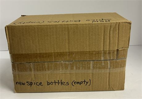 Small box full of spice bottles empty