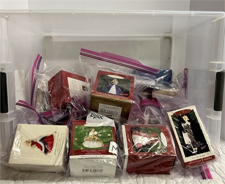 A tote full of vintage hallmark holiday ornaments