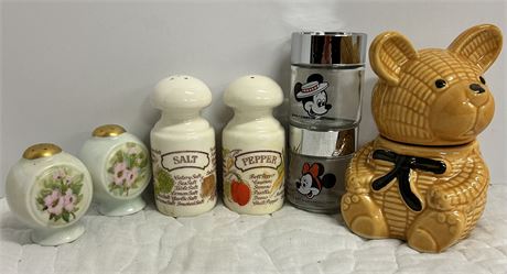 Three sets of salt, pepper shaker, and a honeypot