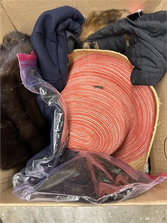 A box full of different hats