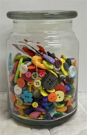 A small container full of buttons