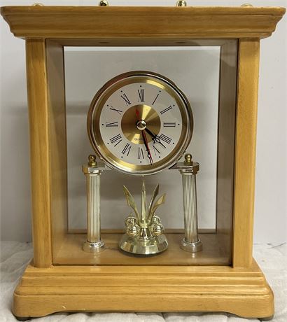 Beautiful, small Clock in wooden case