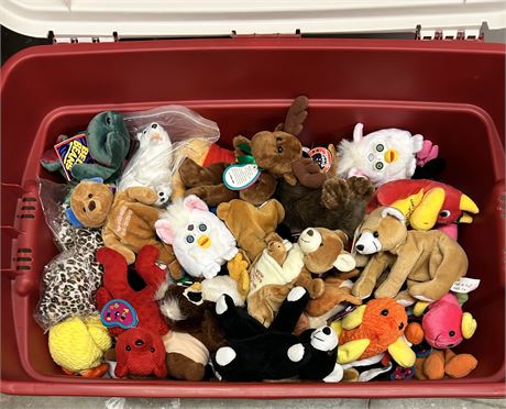 a tote full of assorted stuffed animals, including beanie babies