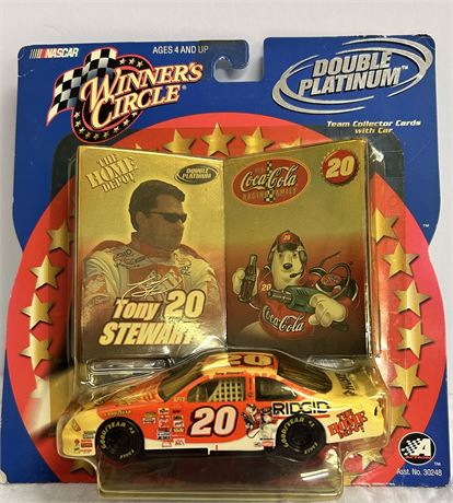 Tony Stewart # 20 race, car and team collector cards in original package