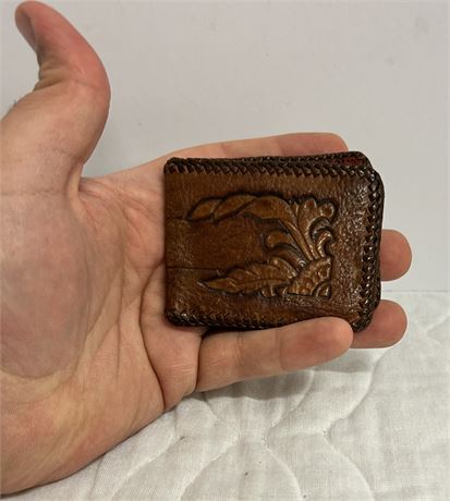 Two handmade leather wallets