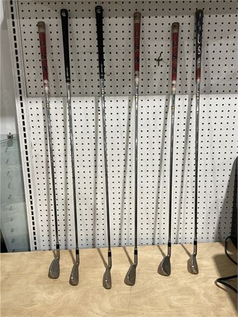 Six Cleveland Golf Clubs