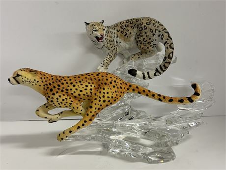 Four gorgeous statues of different big cats