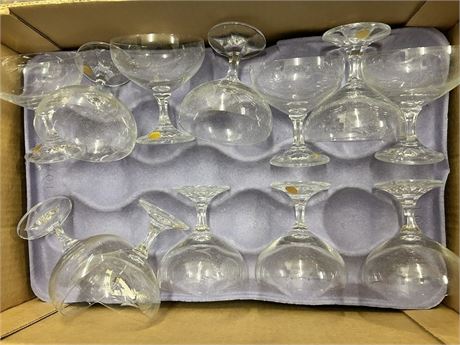 Box full of beautiful small martini glasses