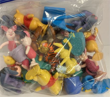 1 gallon size bag of a mix of vintage Winnie the Pooh and others figurines