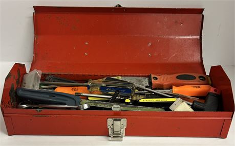 Small red tool box with a variety of tools