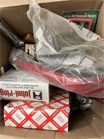 Box of a mix of tools and plumbing parts