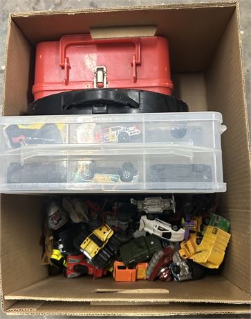 Box full of vintage toy cars