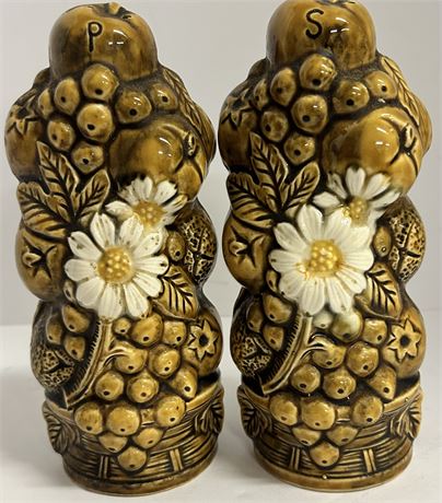 Two unique salt and pepper shakers