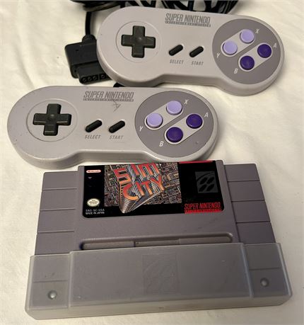 Vintage SuperNintendo Controllers and Sim City Game