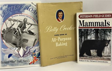 Three books Betty Crocker, book about Mammals.