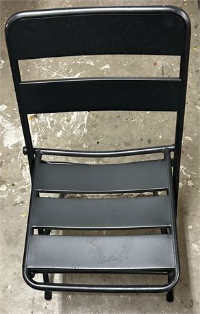 Two nice folding black chairs