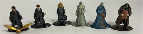 Very small Harry Potter metal figures about 1.5 inches tall