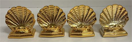 Four small brass seashells decor